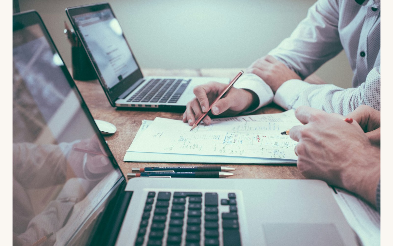 Executive resume writer and career coach reviewing an ATS-optimized resume